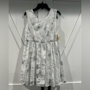 Girls white and silver formal style dress with V neck front and back